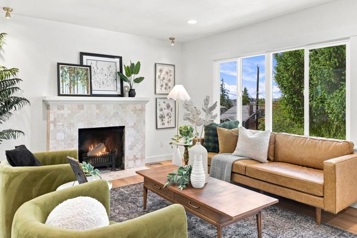 Living room refresh. Fireplace tile surround, new flooring and lighting
